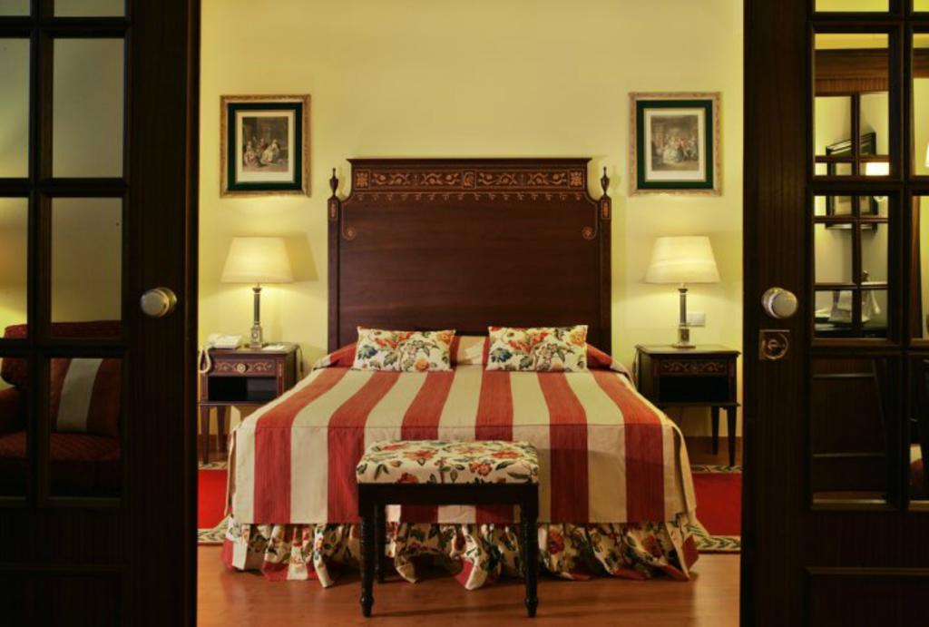Hotel Avenida Palace Lisboa Phòng bức ảnh A bedroom at the hotel
